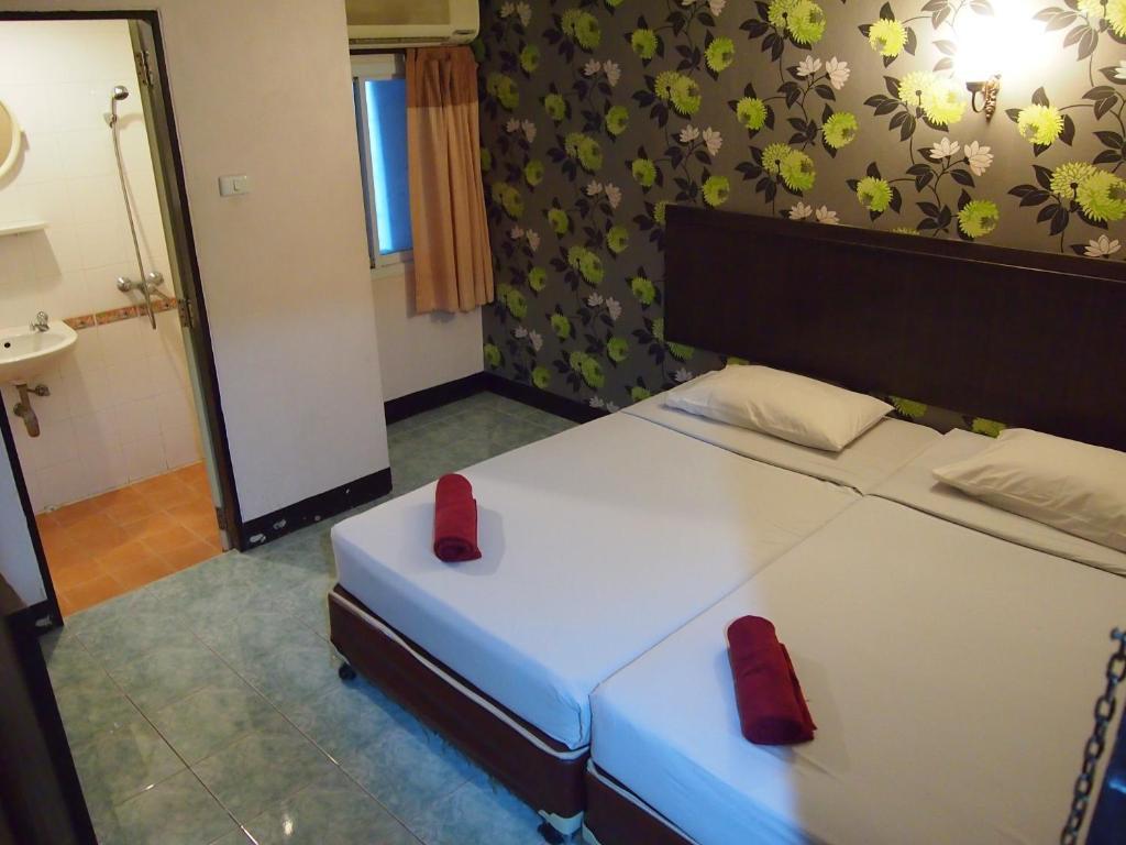 Four Sons Inn Bangkok Pokoj fotografie